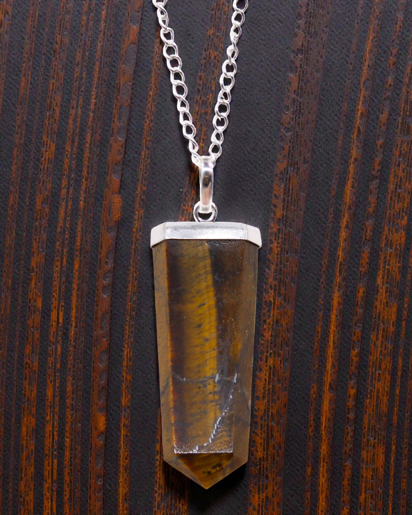 Tiger Flame – Flat Pendant of Tiger’s Eye in Crystal Cut