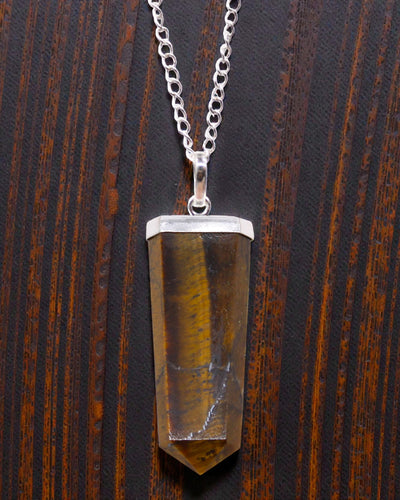 Tiger Flame – Flat Pendant of Tiger’s Eye in Crystal Cut