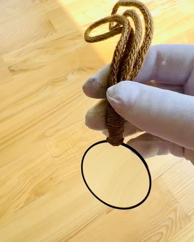 Handheld magnifying glass with artisan cord - "Indian Elegance"